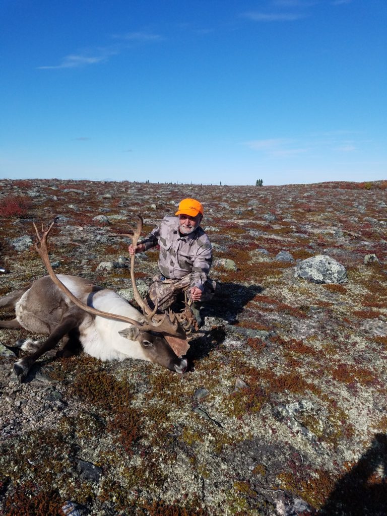 Portrait of Lanny Scwartz with a freshly killed caribou