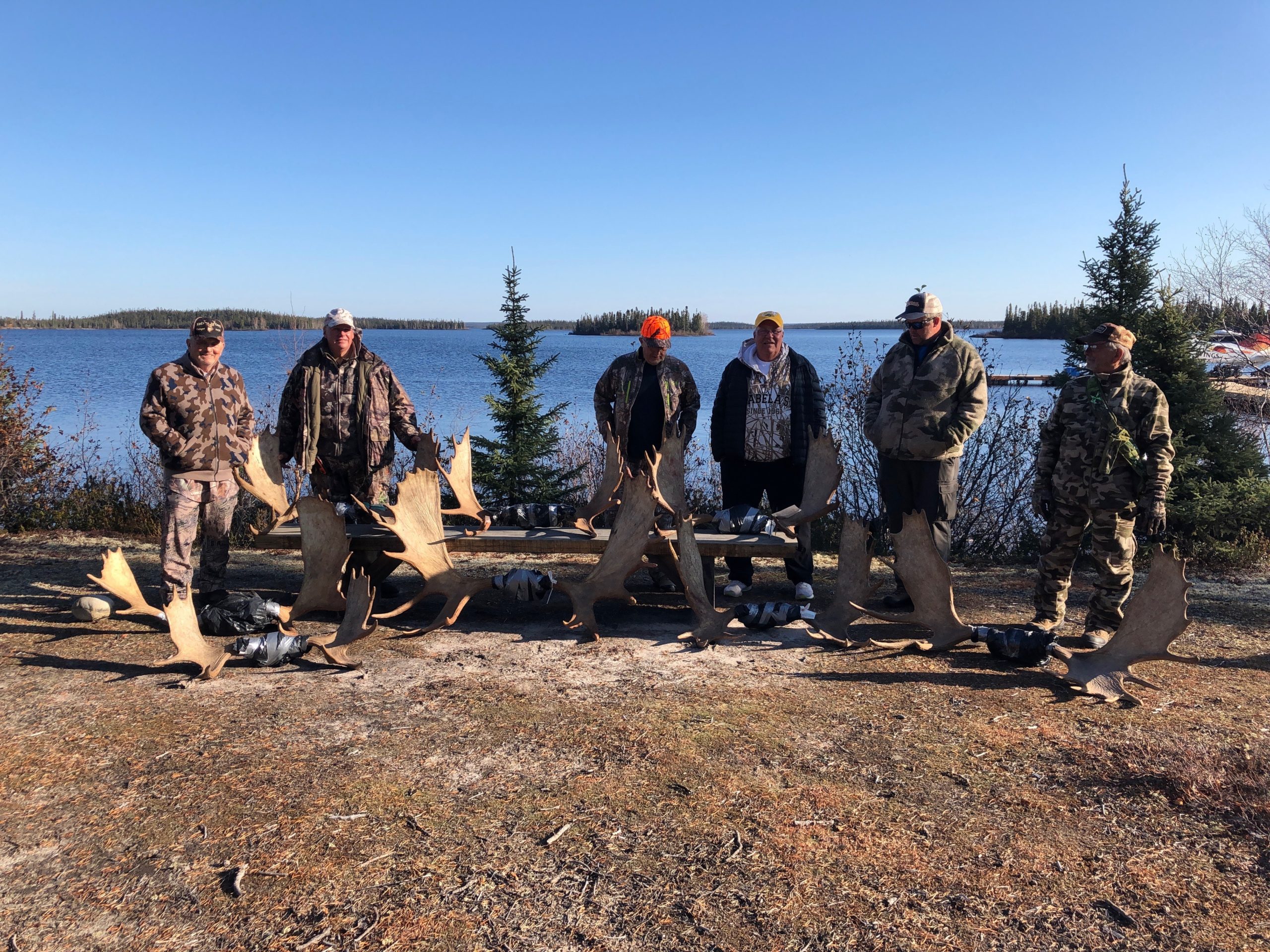 6 men and 6 moose antlers on week two of moose hunting